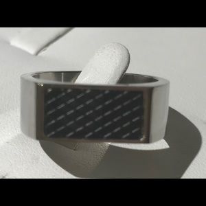 Silver and black ring